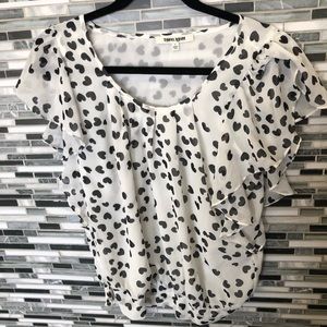 Daniel Rainn white top with black hearts